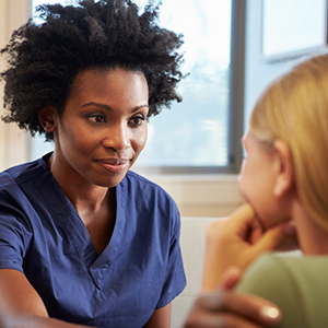 Healthcare professional interacting with child